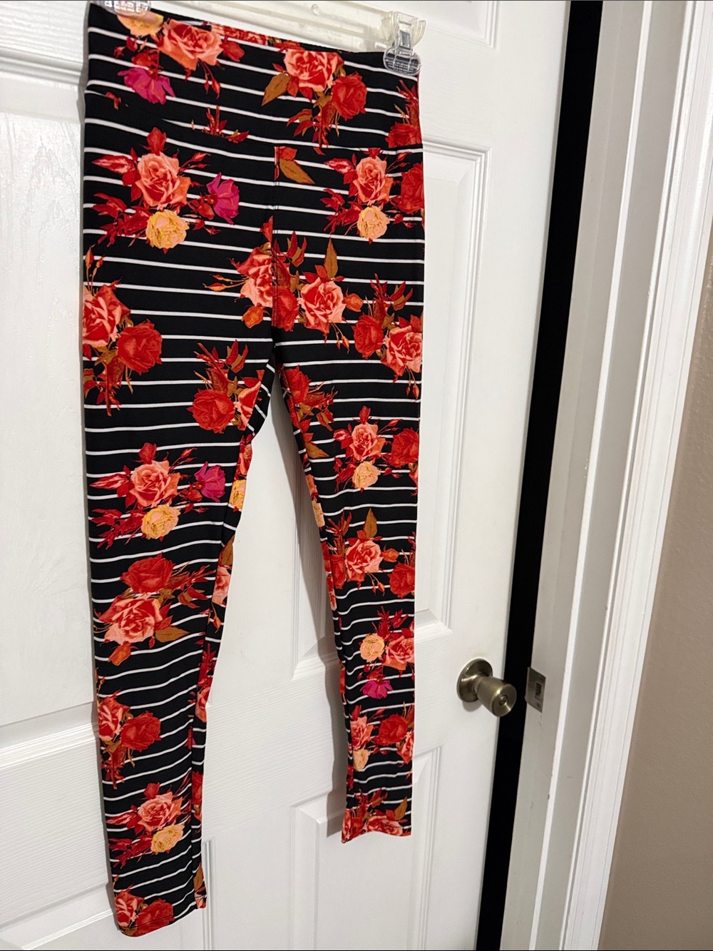 LuLaRoe Black Striped Leggings with Red & Orange Floral Print